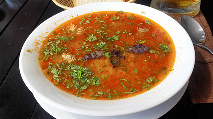 Kharcho - traditional classic spicy Caucasian soup with herbs