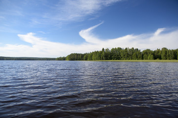 Lake view in the country side on a sunny day. Image taken in Finland.