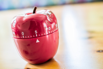 5 Minutes - Kitchen Egg Timer In Apple Shape On Wooden Table
