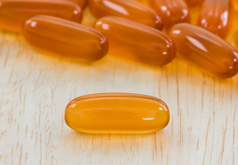 Close up Gel capsule on wooden table