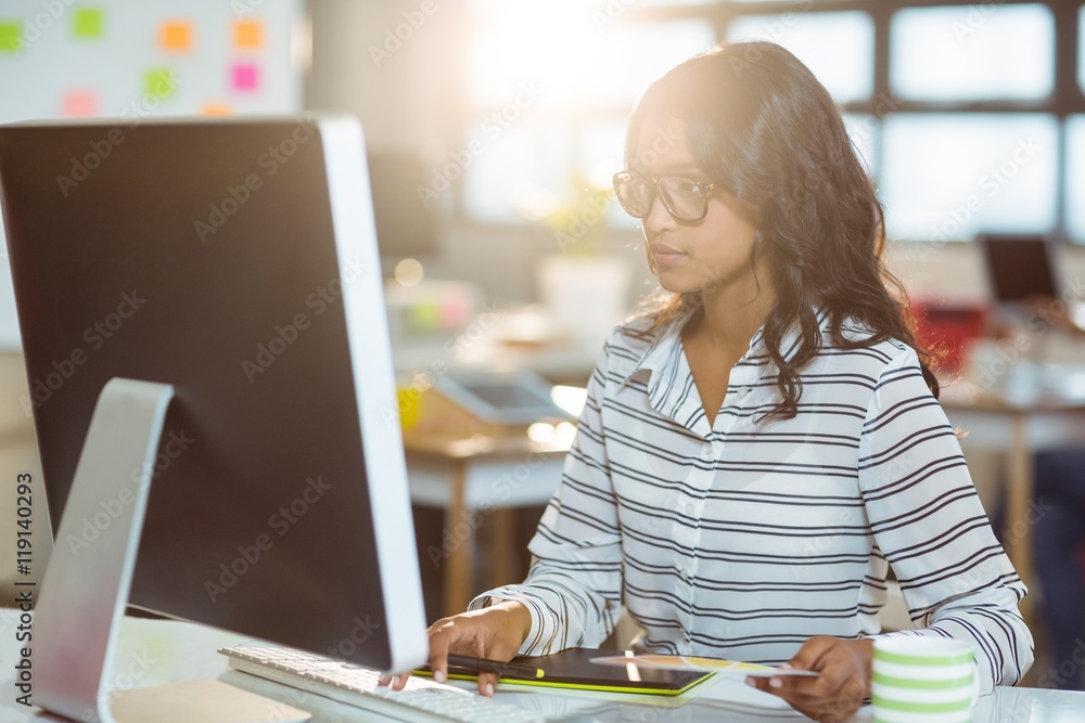 Aufkleber graphic designer working on computer
