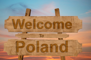 Welcome to Poland sign on wood background