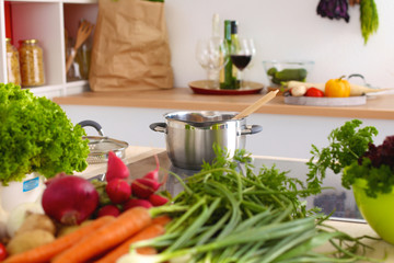 Young Woman Cooking in the kitchen. Healthy Food