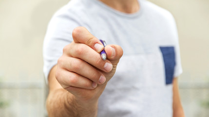 Man writing with a pen