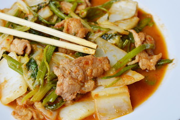 stir fried mixed vegetable and pork in sukiyaki sauce on plate