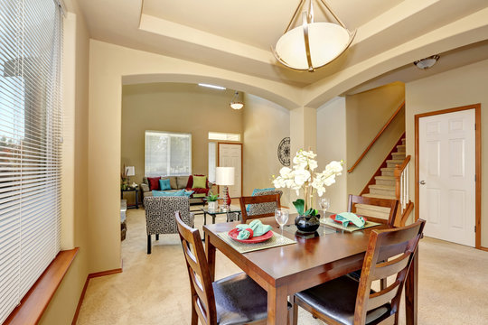 Open floor plan. Dining area and living room with entryway
