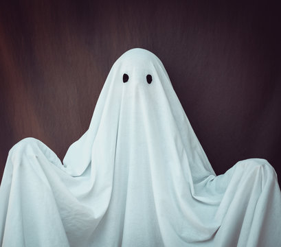 White Ghost on a gray background. Halloween holiday