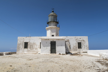 Mykonos island, Greece. Lighthouse Armenistis. The lighthouse, located in Cape Armenistis, was manufactured in 1891 and overlooks the island of Tinos.