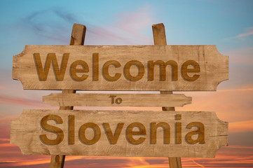Welcome to Slovenia sign on wood background