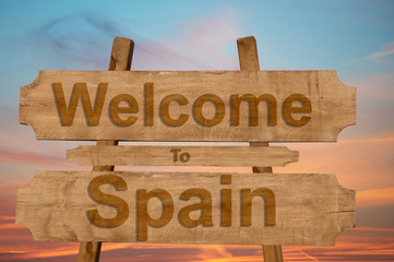 Welcome to Spain sign on wood background