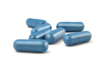 Medical pills on a white background.