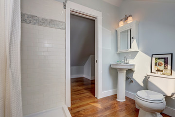 Fototapeta na wymiar Interior design of craftsman bathroom with pastel blue walls