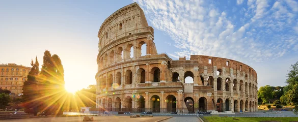 Peel and stick wall murals Historic building Colosseum in Rome and morning sun, Italy