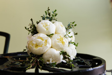 Bridal bouquet of beautiful peonies for a wedding