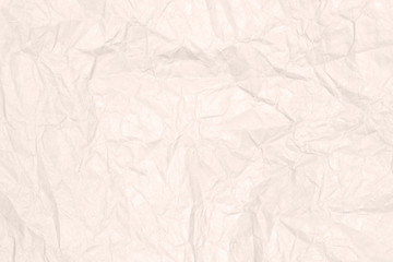 Recycled crumpled light brown paper texture or paper background for design with copy space for text or image.