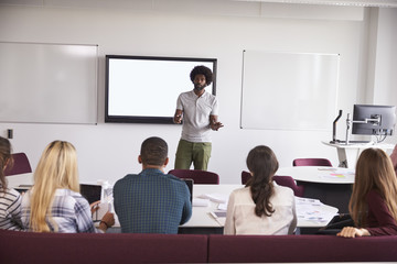 University Students Attending Lecture On Campus