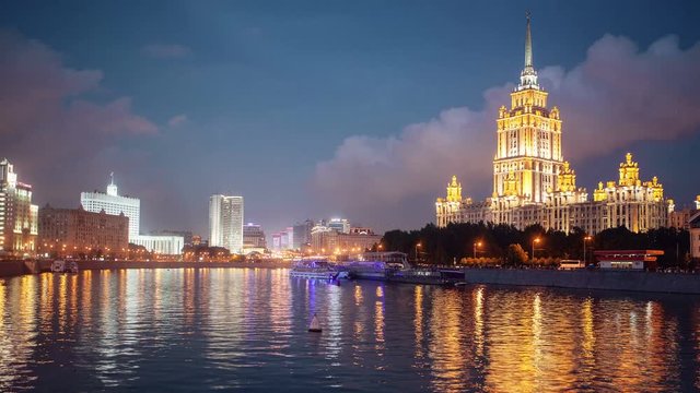 Krasnopresnenskaya and Taras Shevchenko embankments, Moscow. Evening view of government House, the New Arbat street and hotel Ukraine. Timelapse.
