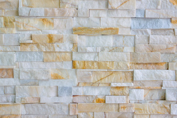 Fototapeta premium Pattern of grey and rough sandstone wall texture and background, stone Cladding wall