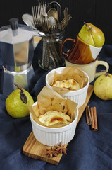 Still life with cottage cheese casserole with pears on wooden de