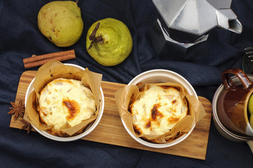 Still life with cottage cheese casserole with pears on wooden de