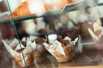 Closeup of a muffin on display in a French cafe