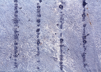 Grungy blue cement wall texture.
