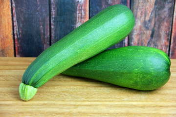 Zucchini set on a wooden cutting board