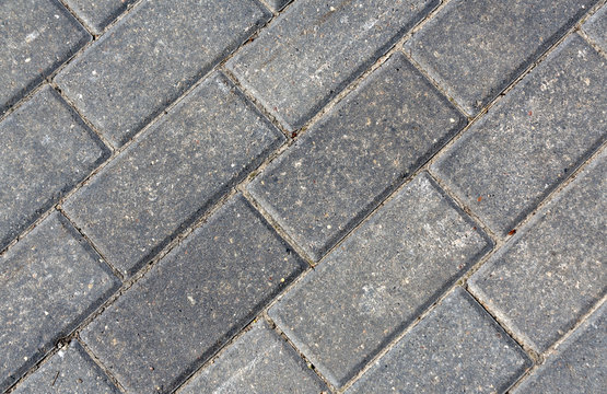Close-up of grey pavement cobble stones.