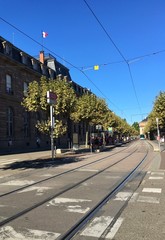 Fototapeta na wymiar street view of the tramway in Strasbourg city during summer in august 