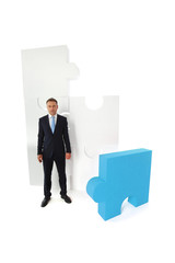 Business man and puzzle