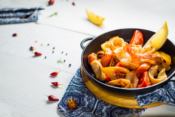 pan with seafood, fried with vegetables