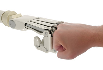 Robot and human fists touching