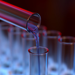Pouring blue liquid in test-tube