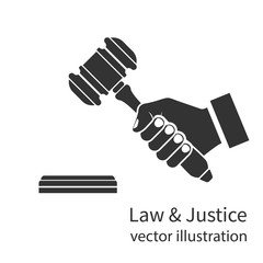 Hand holding judges gavel icon.