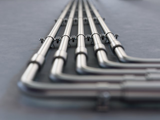 Metal pipes mounted on a wall