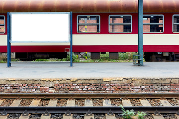 Empty railway station with track and place for promotion.