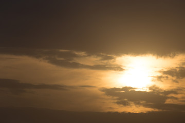 storm clouds at sunset as background