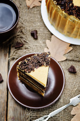 Pumpkin and chocolate layer cake with salted caramel cream chees
