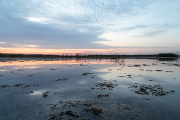 beautiful sunrise of the sun on the lake