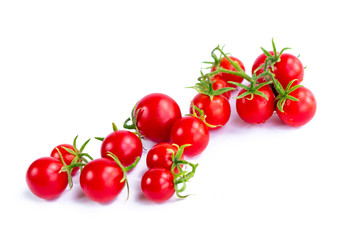 Cluster of tomatoes on white background
