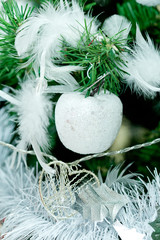 New year Cristmas white silver decorations on green pine firtree