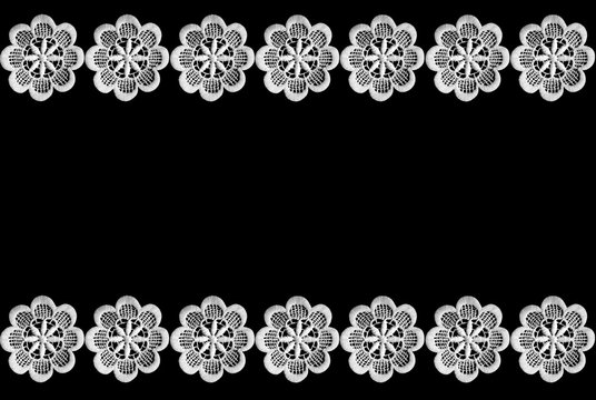 Lace border isolated on black background