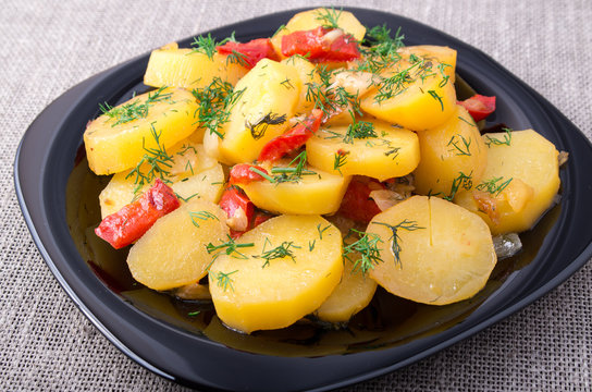 Close Up view on stew of potatoes with bell pepper