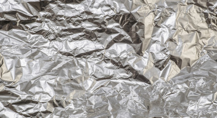 Crumpled aluminum foil texture background