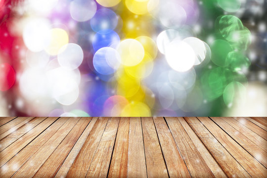 image of wood table and blurred bokeh background with colorful l