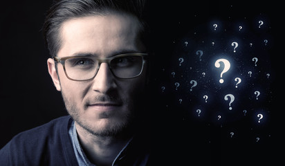 man with many question mark near him