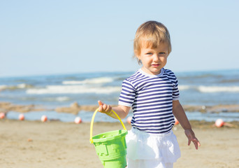 Baby playing on the beach
