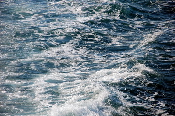 Deep sea foaming  surface background, close up