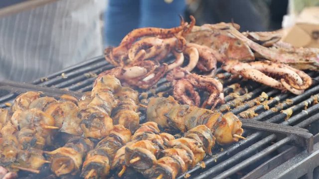  preparation of squids on the grill, close up