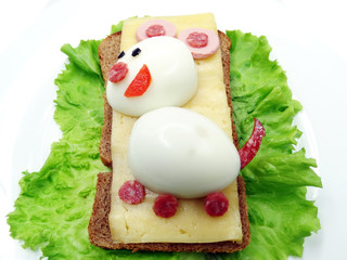 creative vegetable sandwich with cheese and sausage